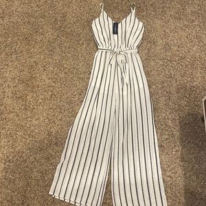 Size small white and black striped jumpsuit
